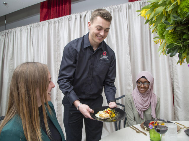 Student working with University Catering