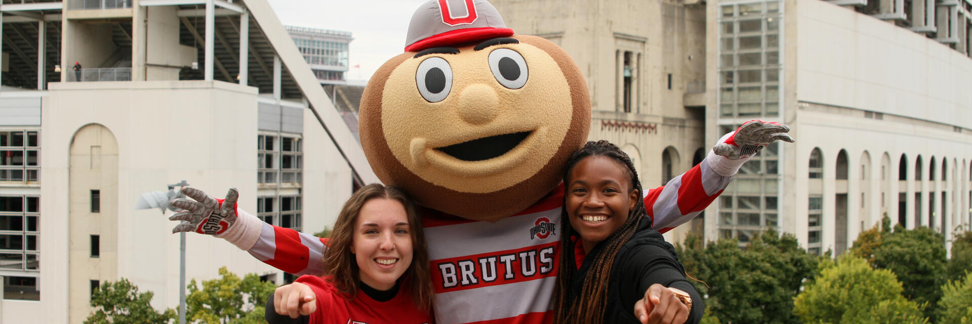 Brutus hanging out with a few people.