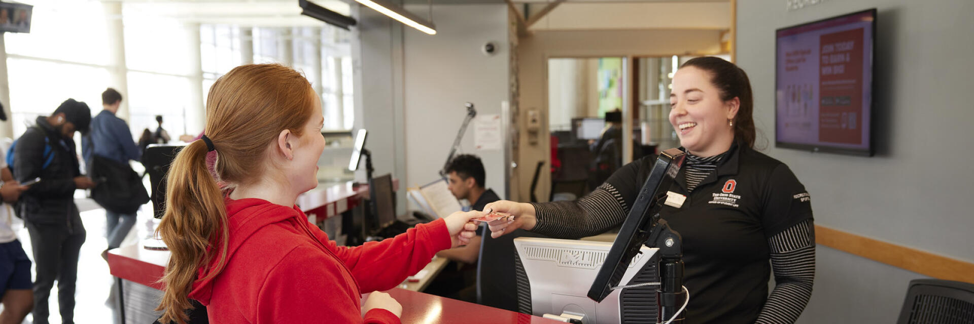 Student Staff assisting at the front desk of the RPAC