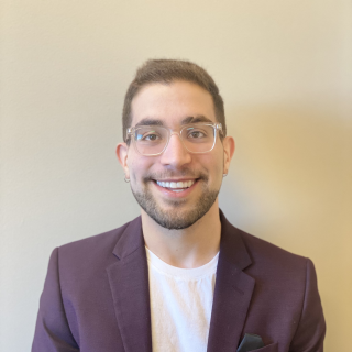 a photograph of Elijah Balogh who is the Business Development and Operations Manager